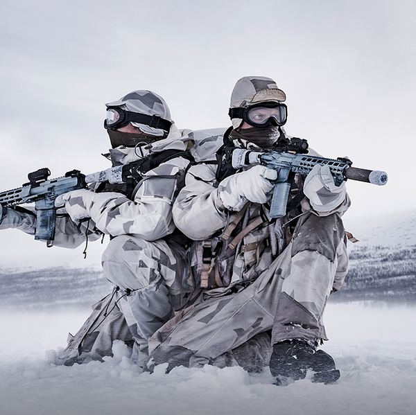 Soldier wearing snow camouflage clothing